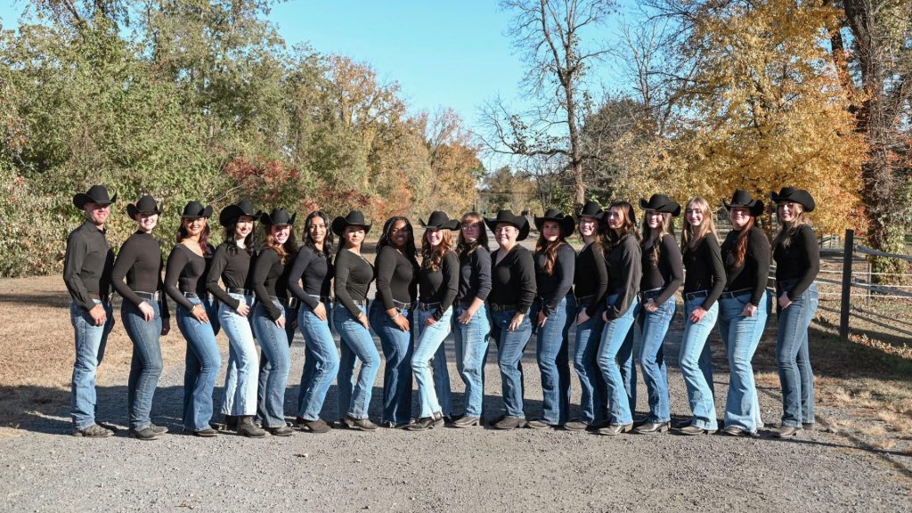 The Western Team posing for a photo outside.